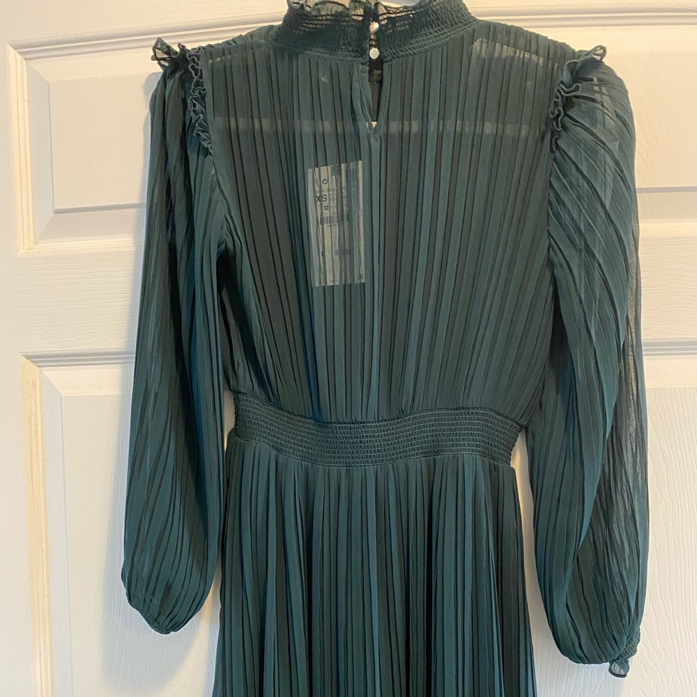 Gorgeous dark green plated dress